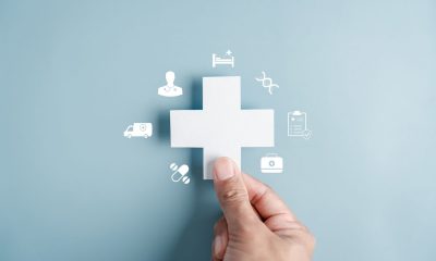 Healthcare insurance and medical coverage concept. white medical cross health protection, treatment access, and reliable healthcare services.